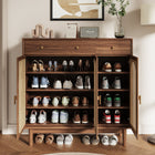 Meuble à chaussures cannage sur pieds